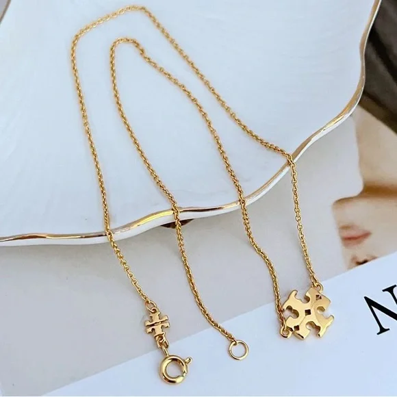 TORY BURCH • Gold Kira Logo Charm Pendant Necklace - Picture 3 of 7